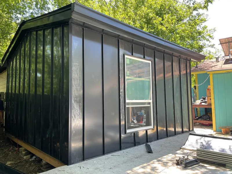 Black standing seam metal wall panels for Metal Roof Installation in Williamson